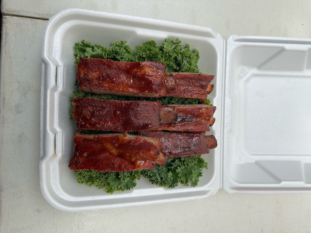 pork ribs in a to-go box